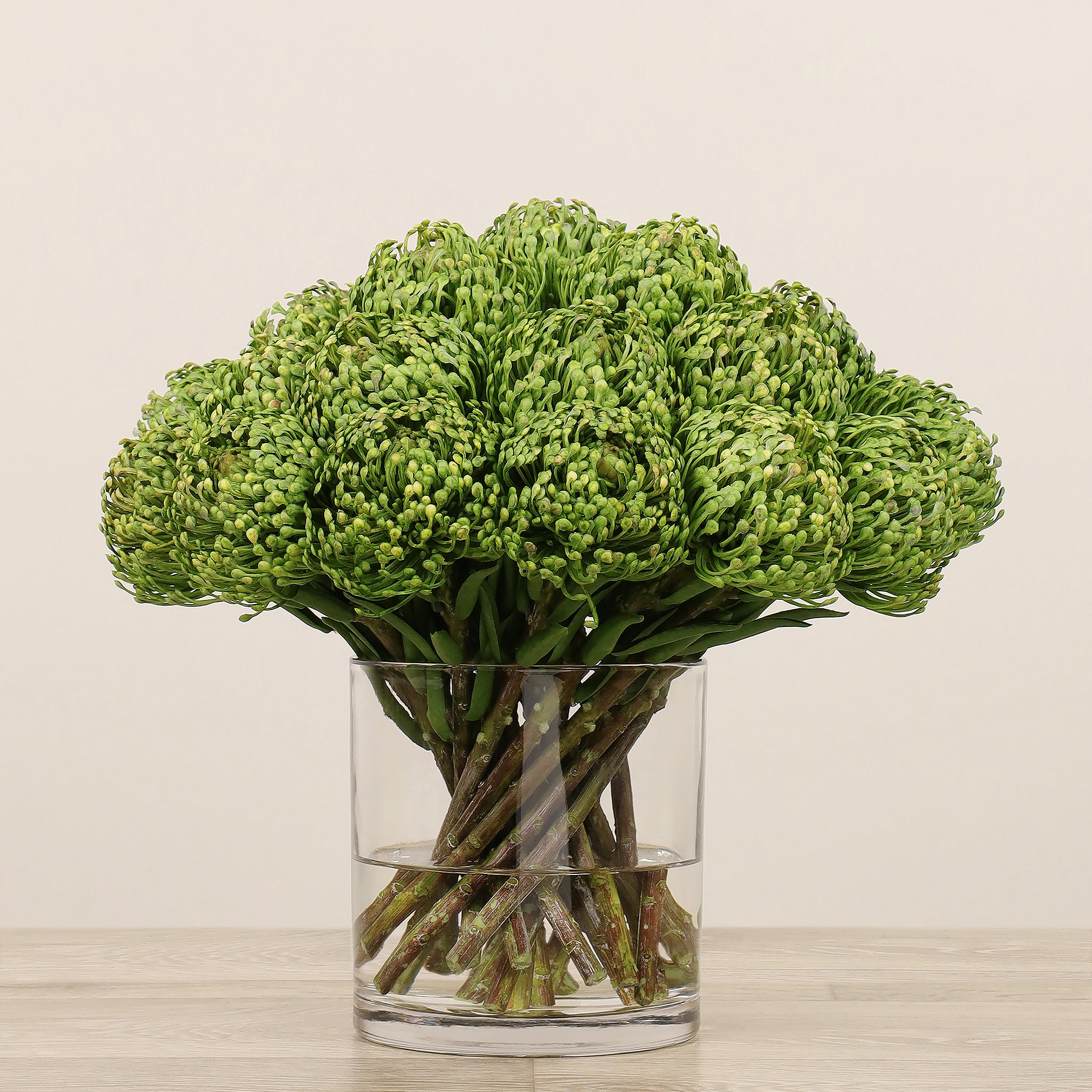 Pin Cushion Arrangement in Glass Vase